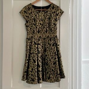 Black and gold cocktail dress.